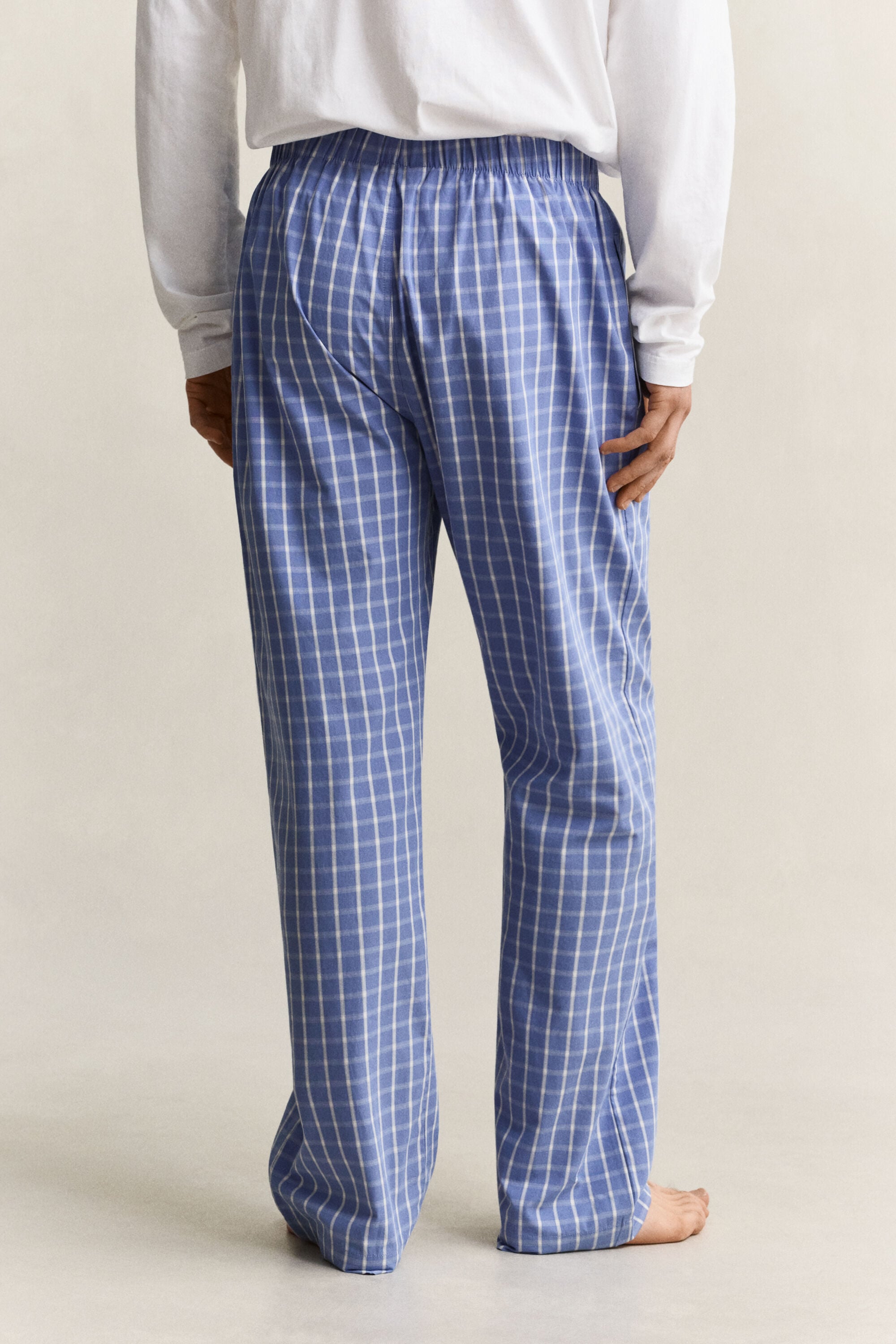 Calças de pijama com padrão de xadrez