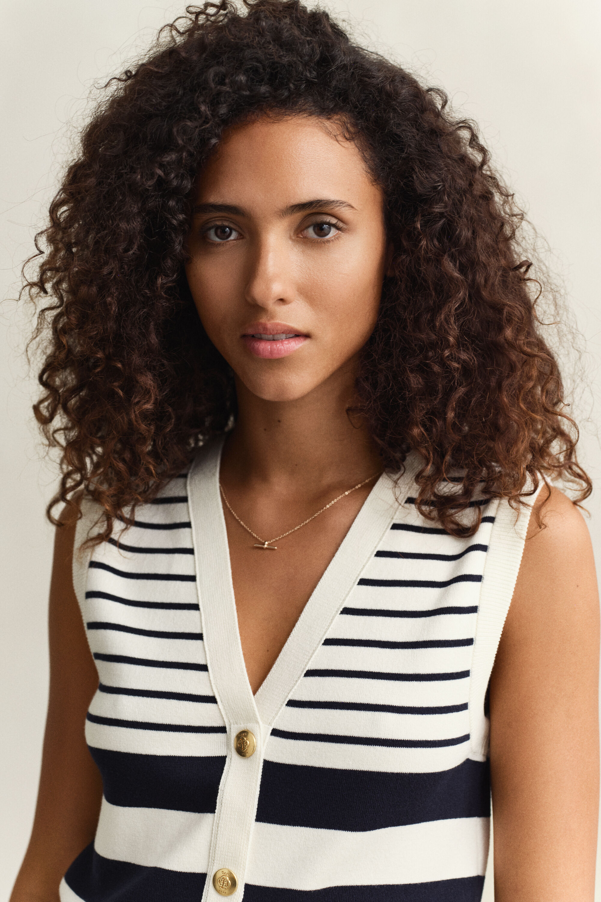 Colete de malha às riscas