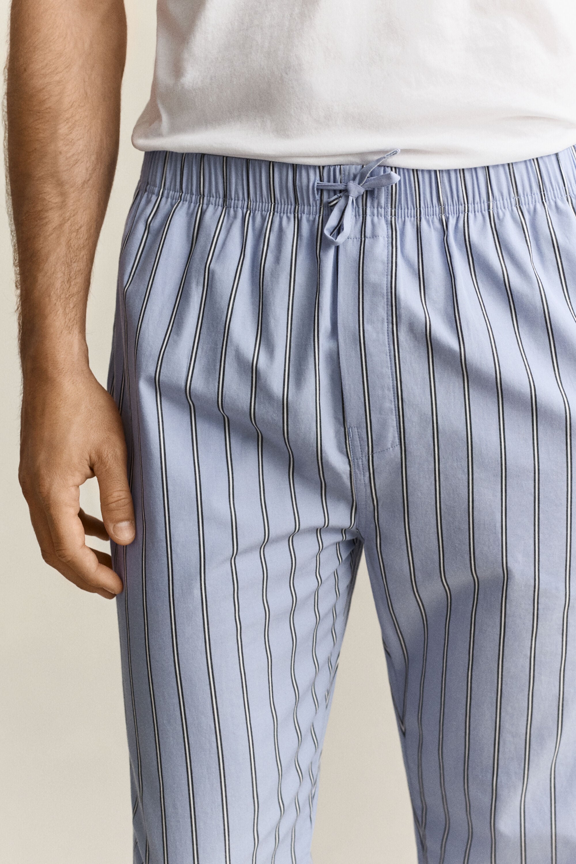 Calças de pijama em popelina às riscas