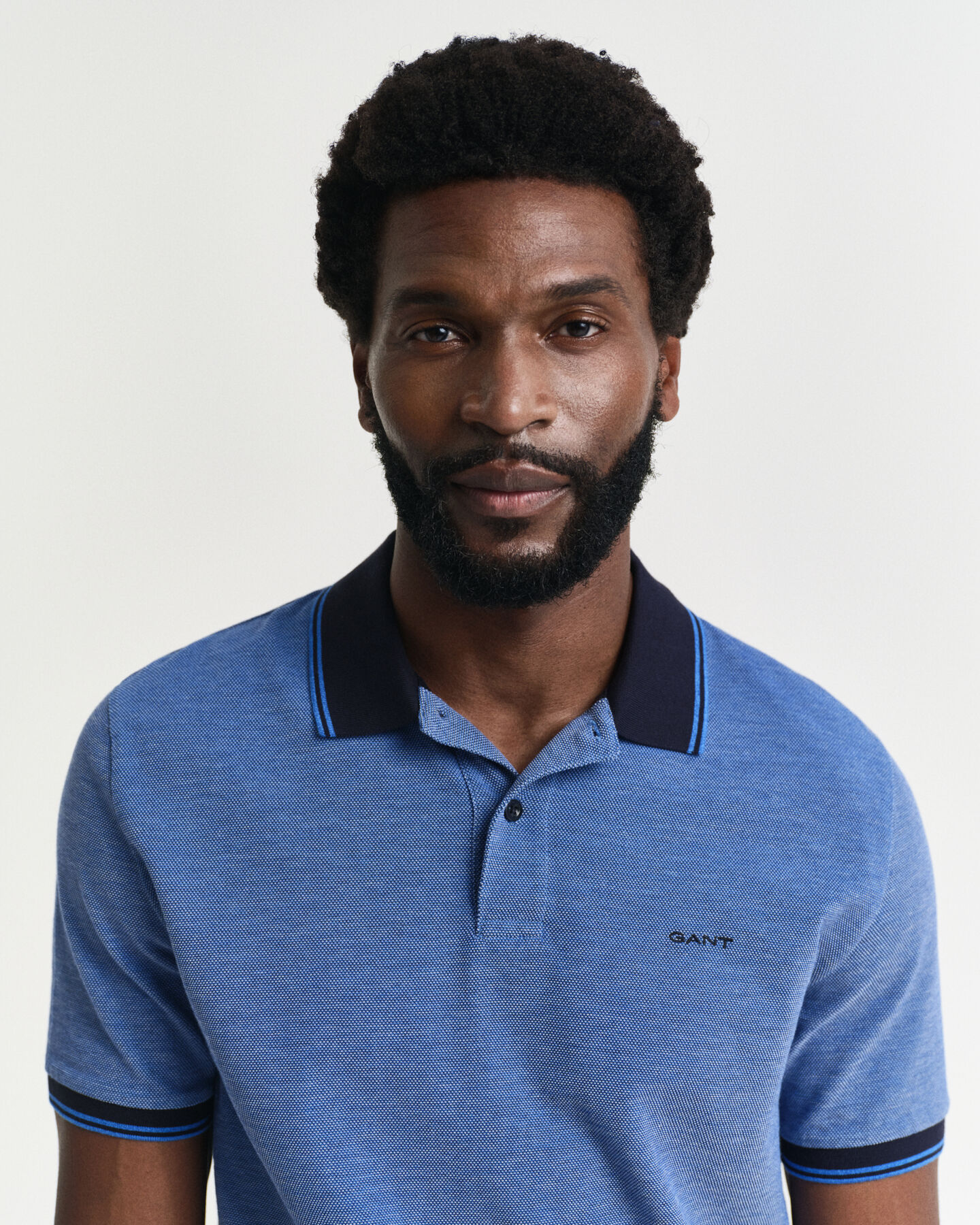 Polo em piqué Oxford em 4 cores