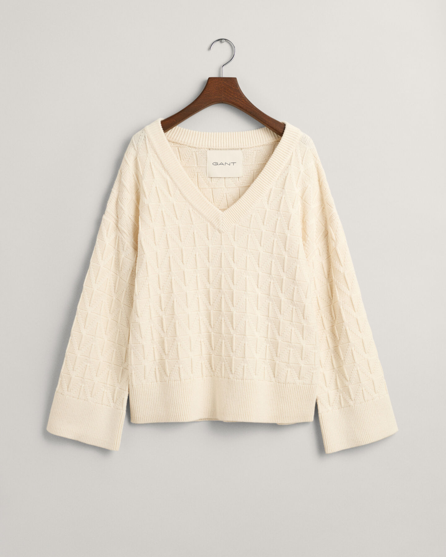 Sweatshirt com decote em V com padr&atilde;o espinha de peixe