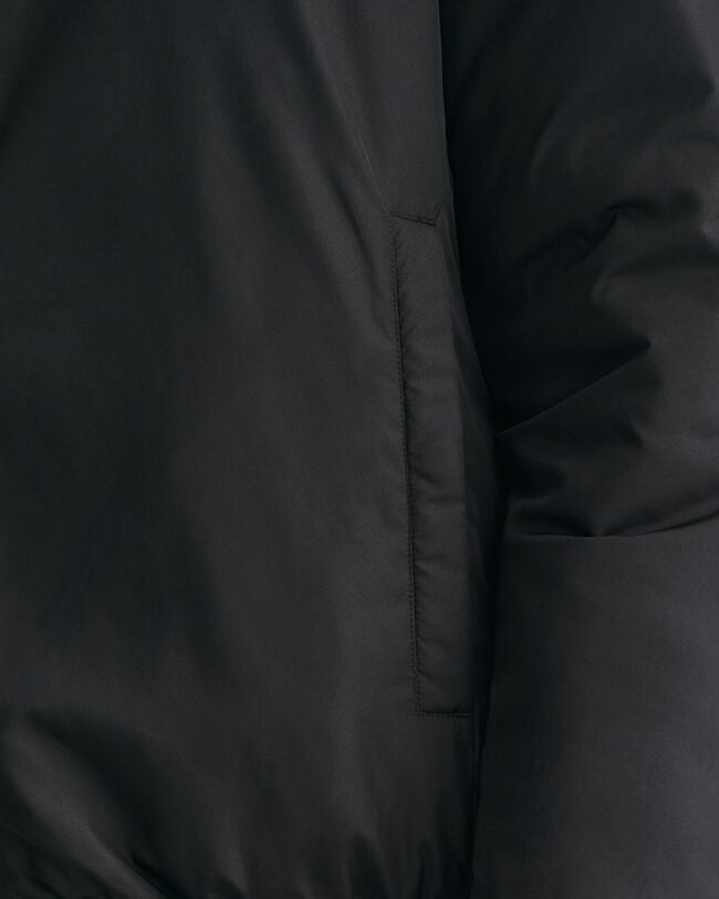 Casaco com capuz revers&iacute;vel