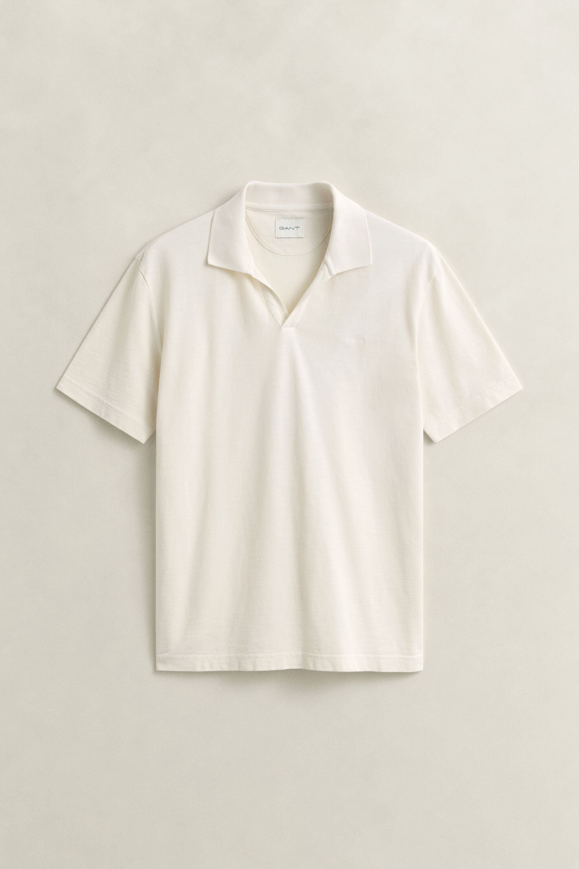 Polo com efeito desgastado