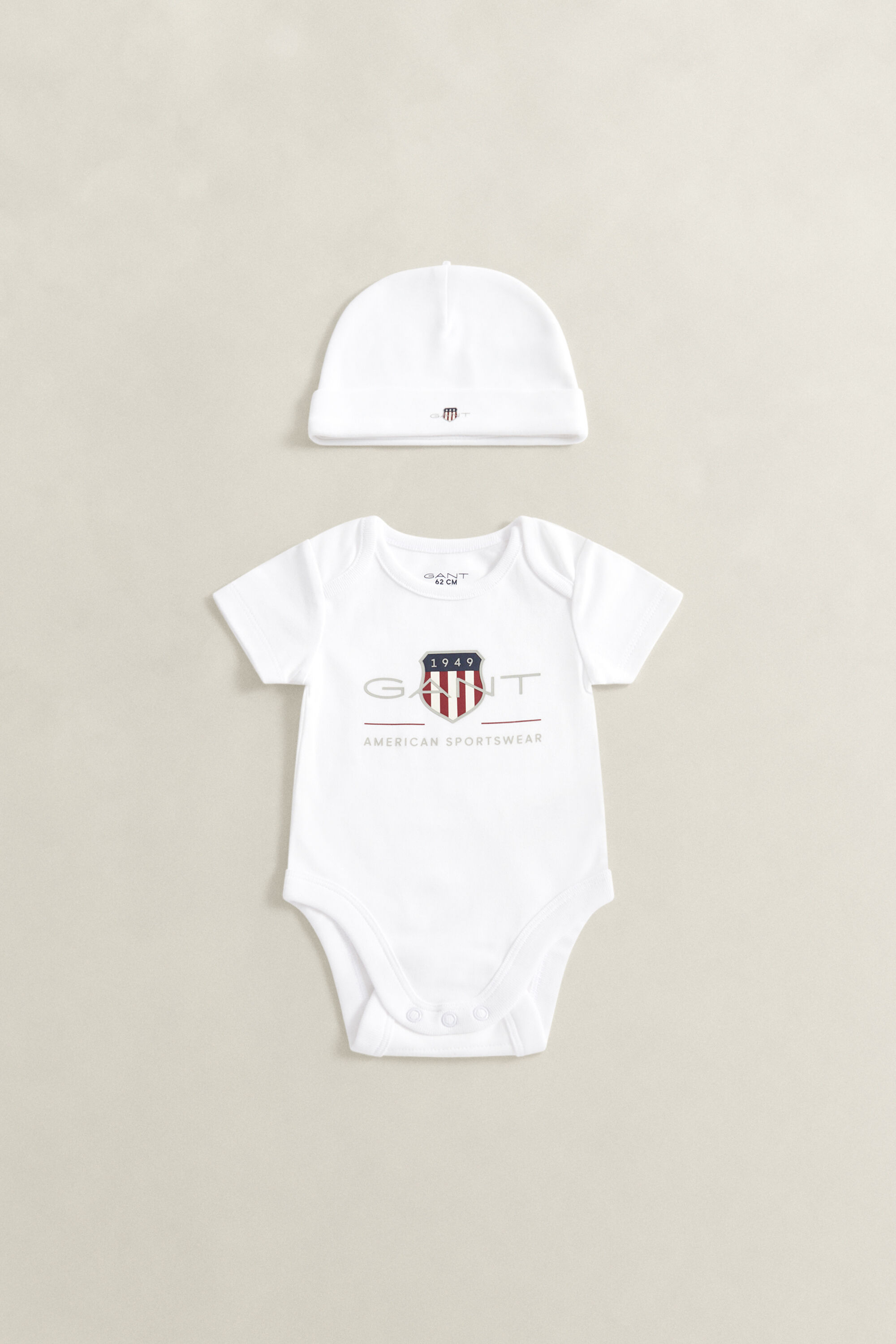 Conjunto de macacão e gorro Baby