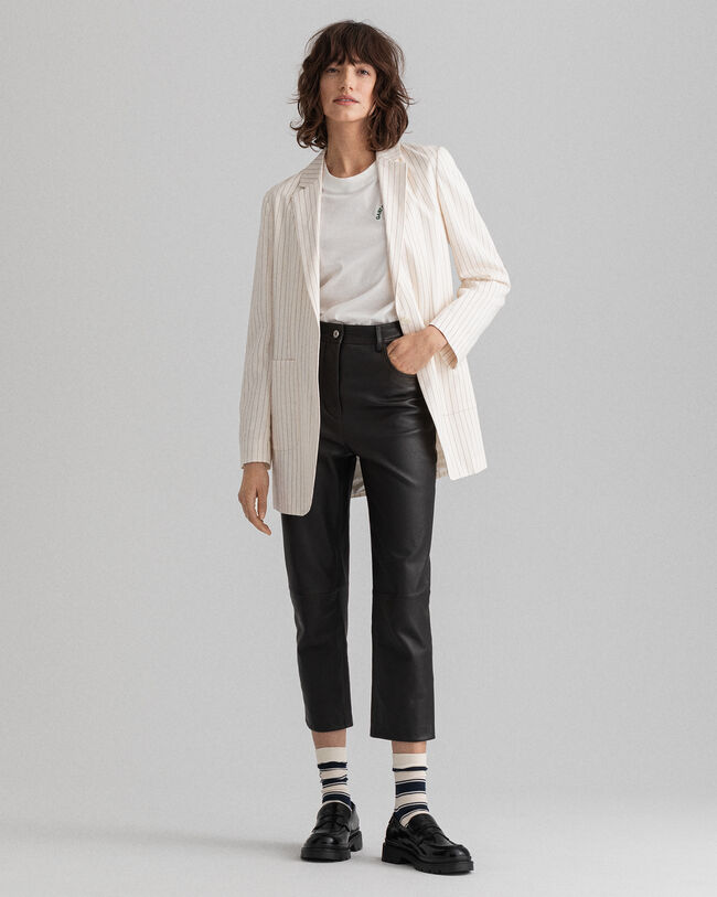 Calças em pele pelo tornozelo com cintura subida