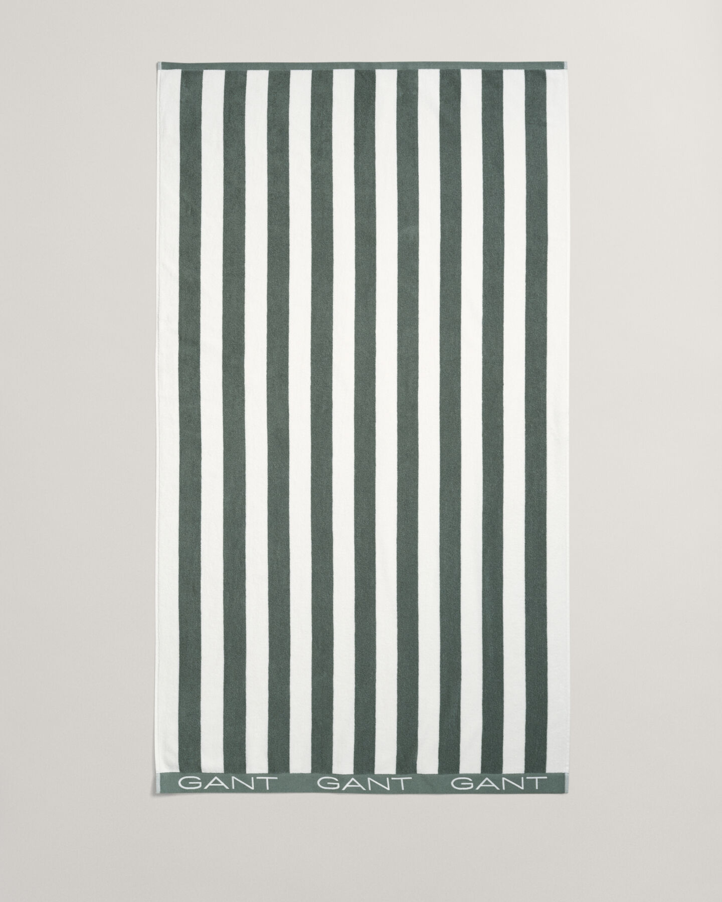 Toalha de praia às riscas em bloco