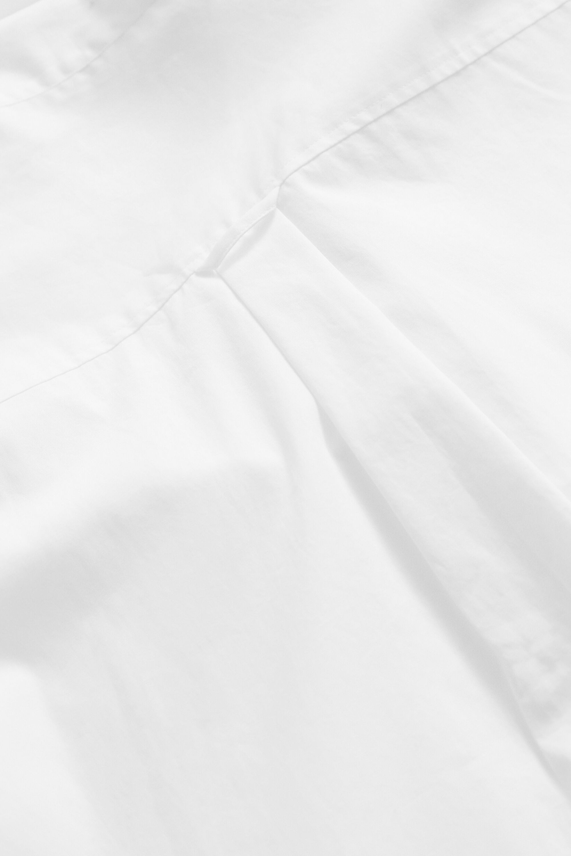 Camisa com laço em popelina