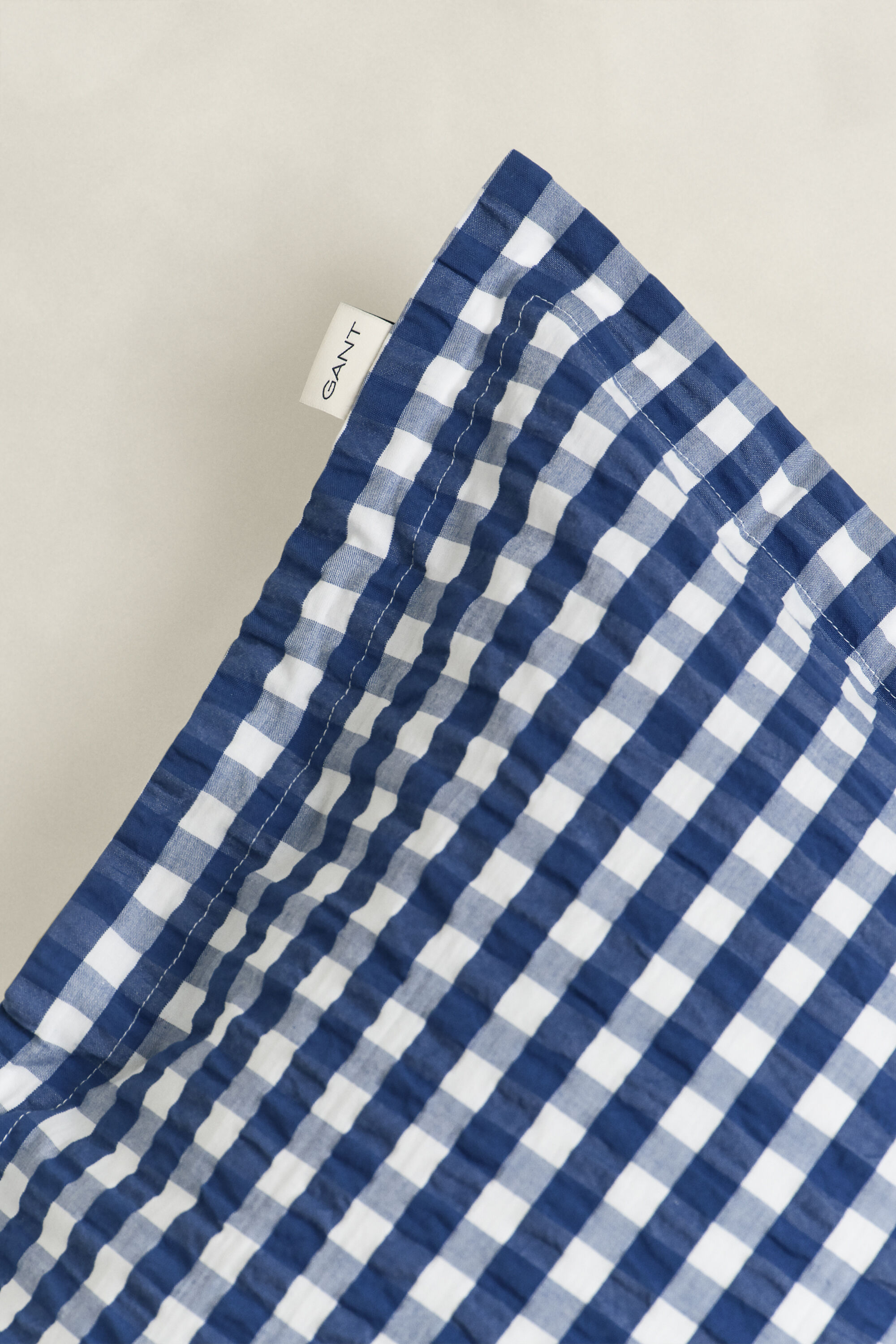 Fronha em tecido Seersucker com padrão de xadrez