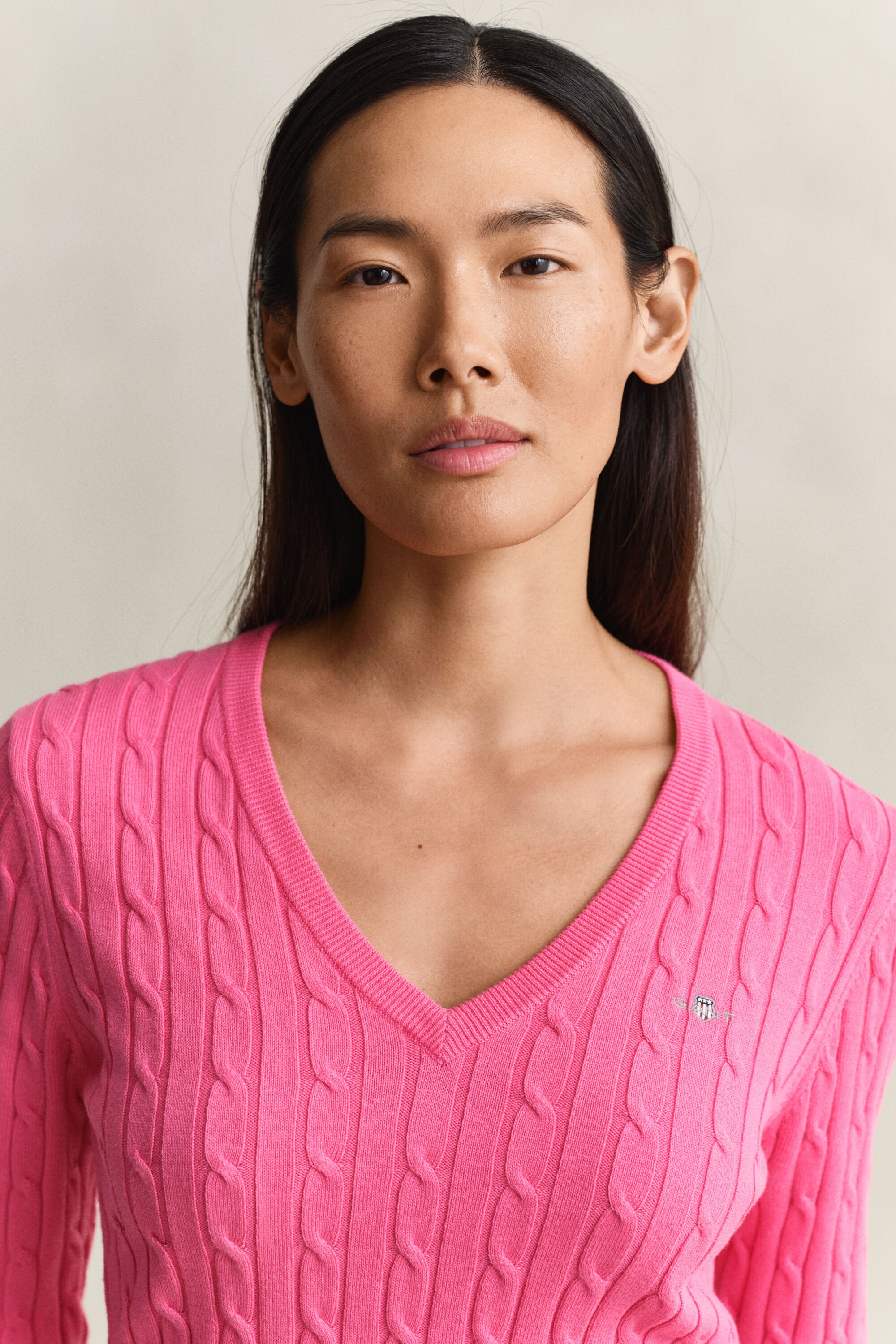 Pullover com decote em V em malha entrançada