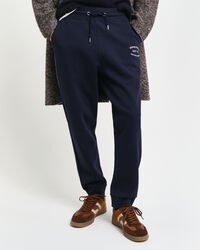 Calças desportivas com grafismo pequeno