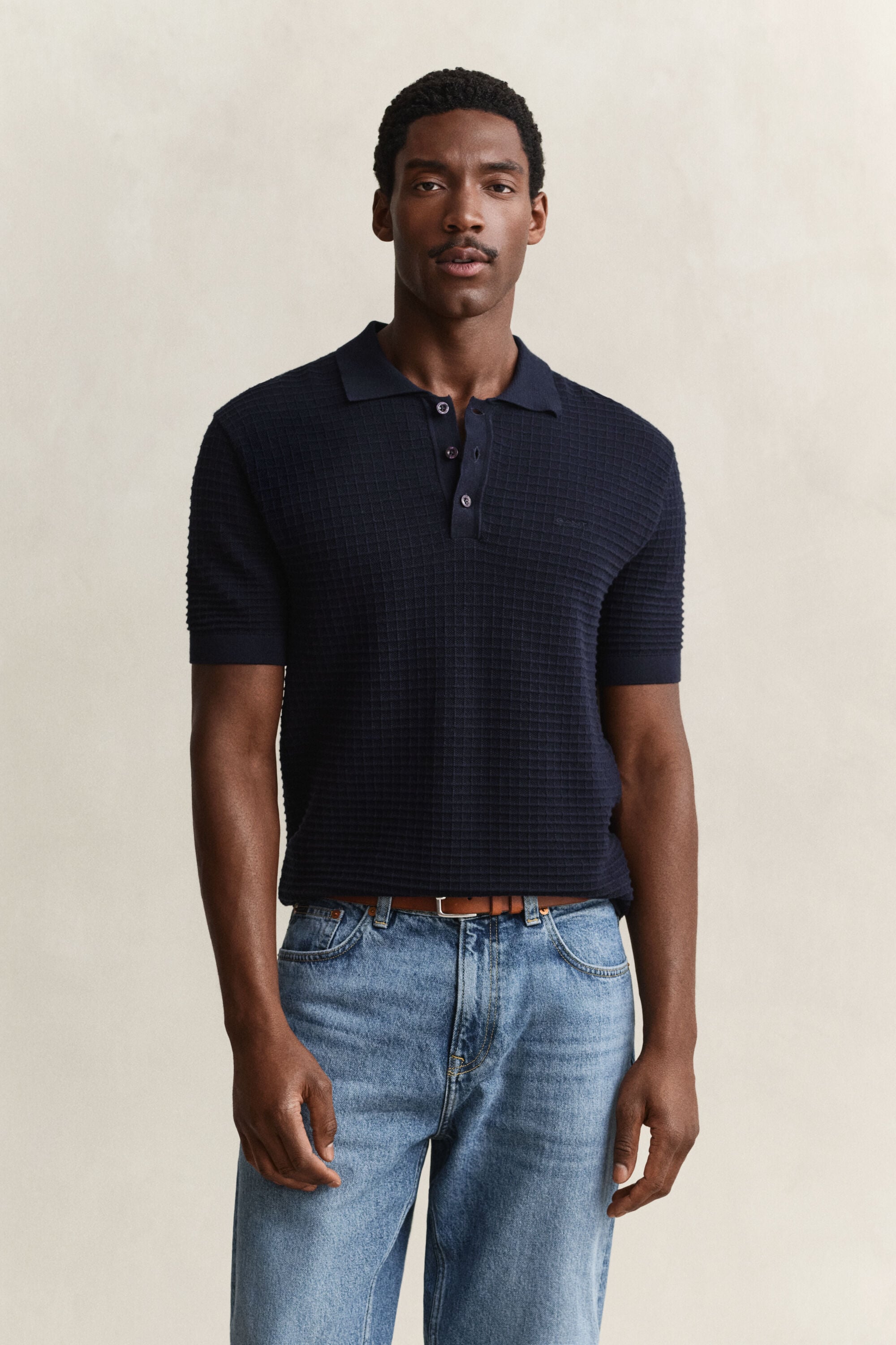 Camisola de malha texturizada tipo polo