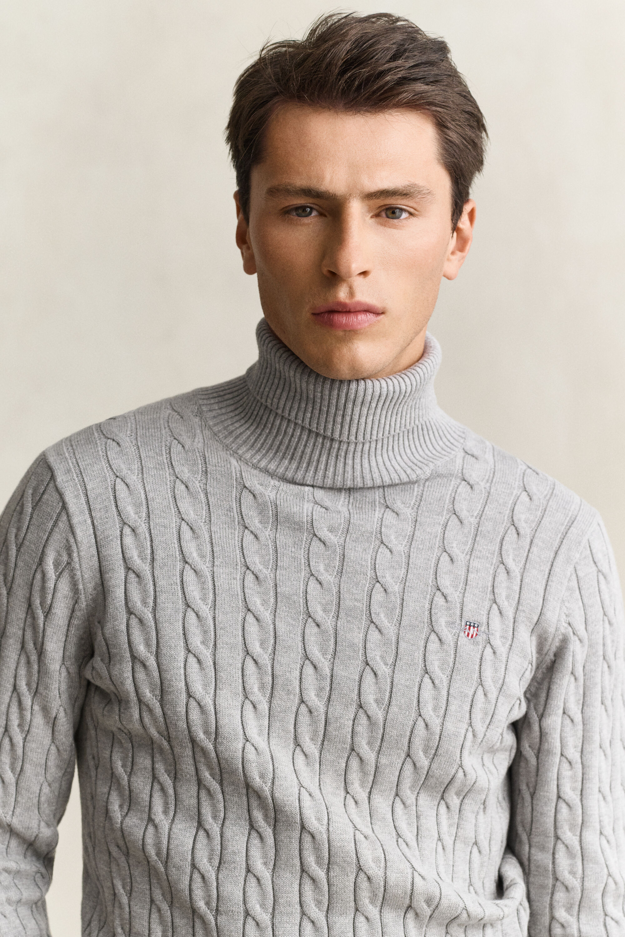 Camisola de gola alta em malha entrançada de algodão