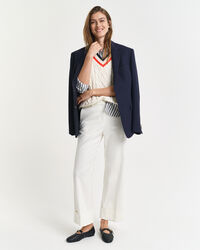 Calças com dobras e pregas