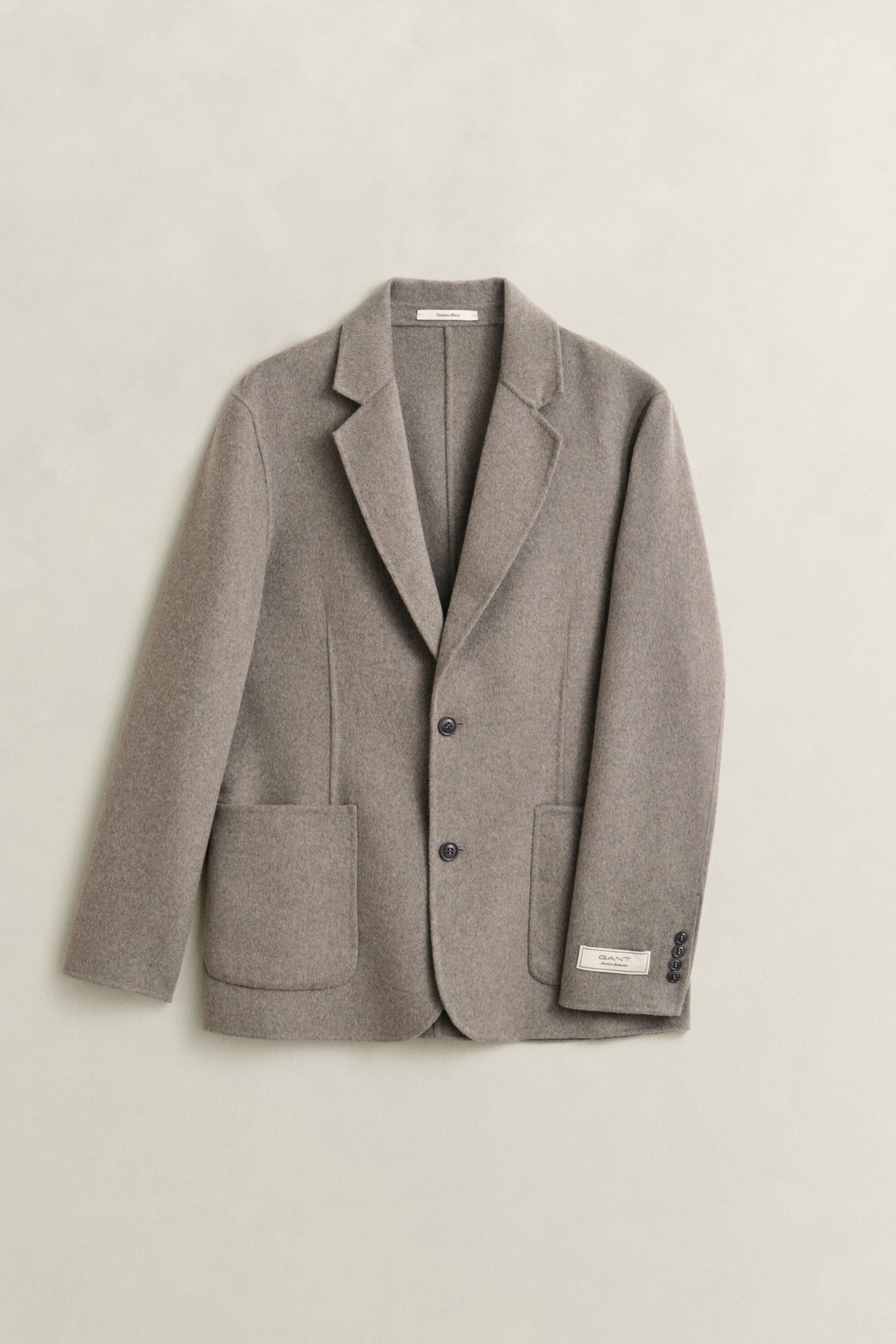 Blazer cosido à mão