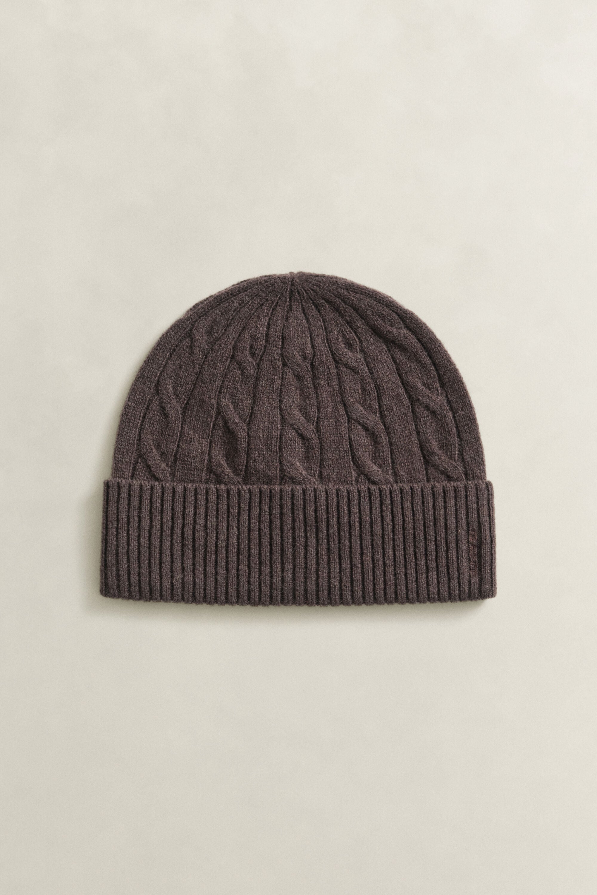 Gorro em malha entrançada de lã