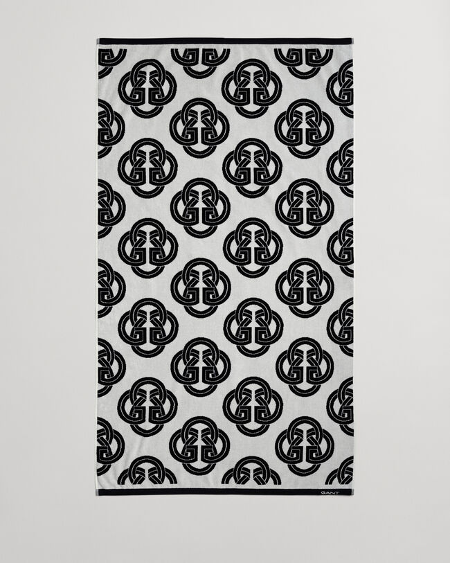 Toalha de praia com estampado Monogram