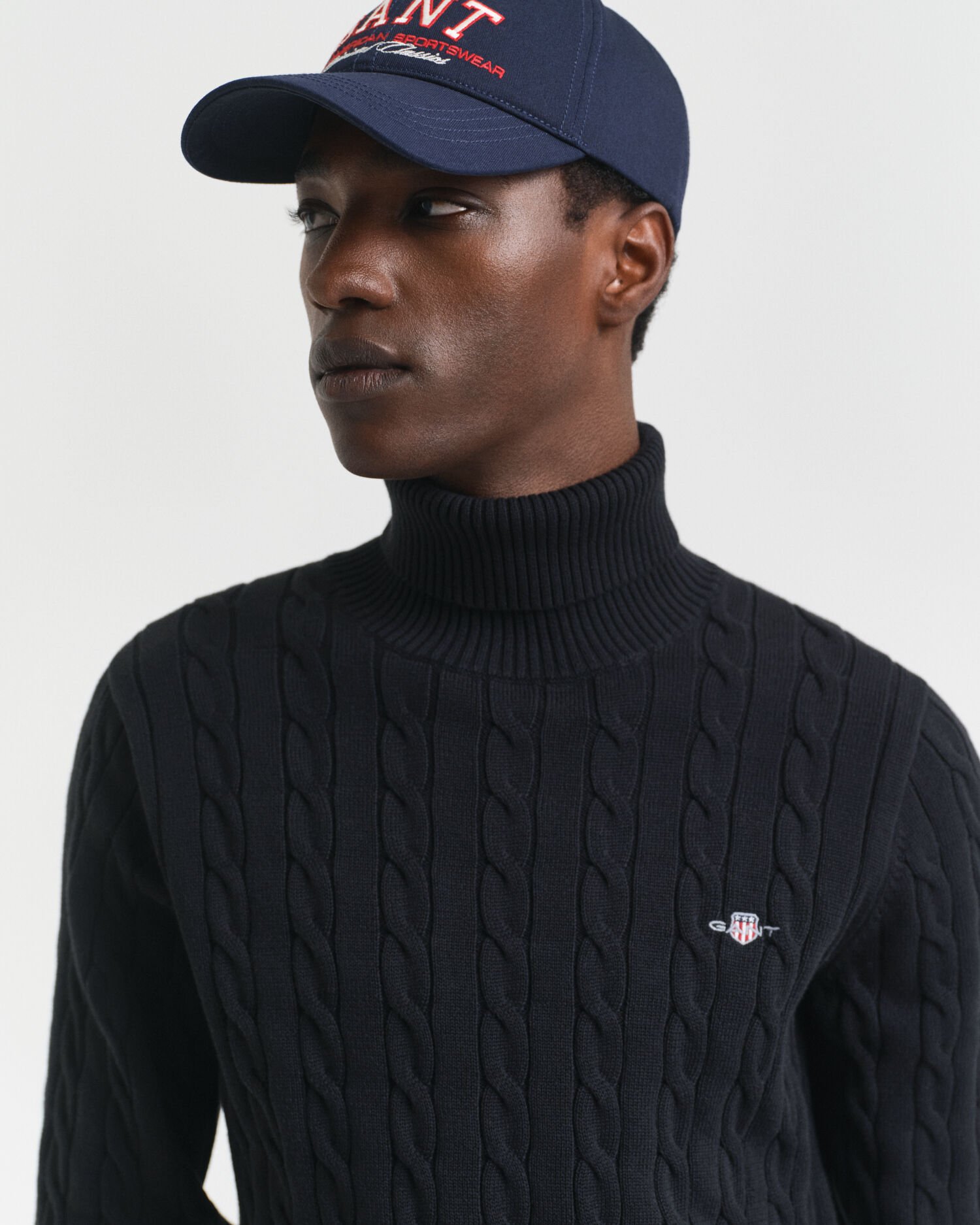 Camisola de gola alta em malha entrançada de algodão