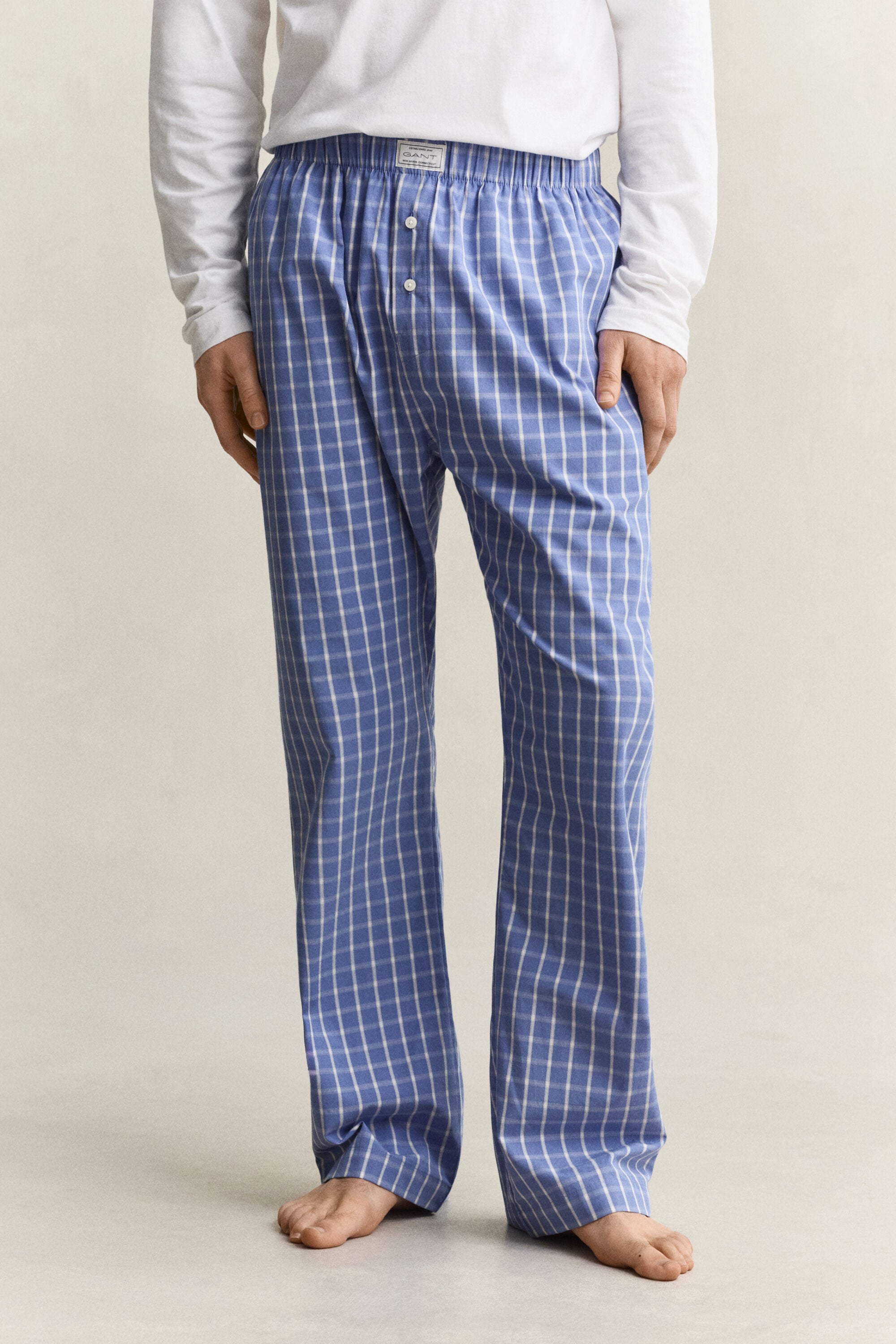 Calças de pijama com padrão de xadrez
