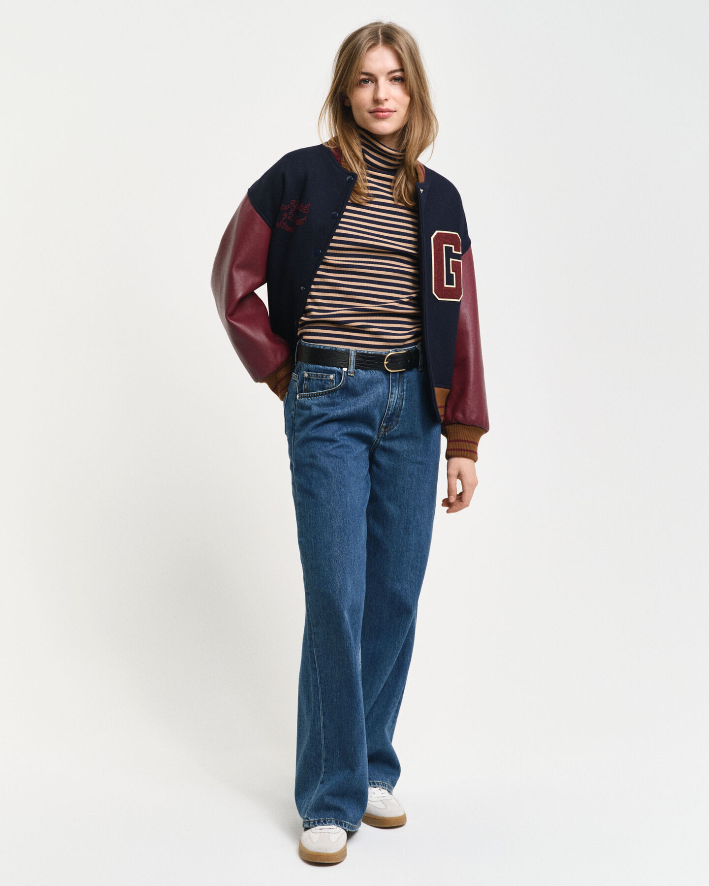 Camisola de manga comprida com gola alta em malha canelada às riscas