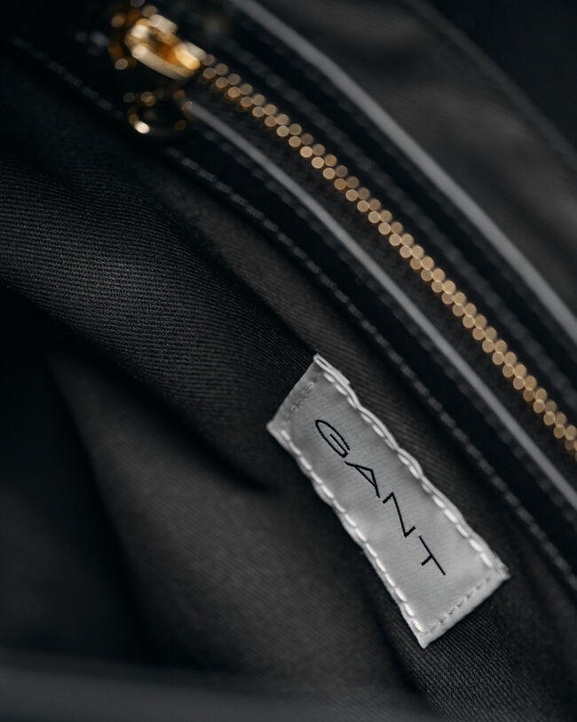 Mala tipo saco em camurça