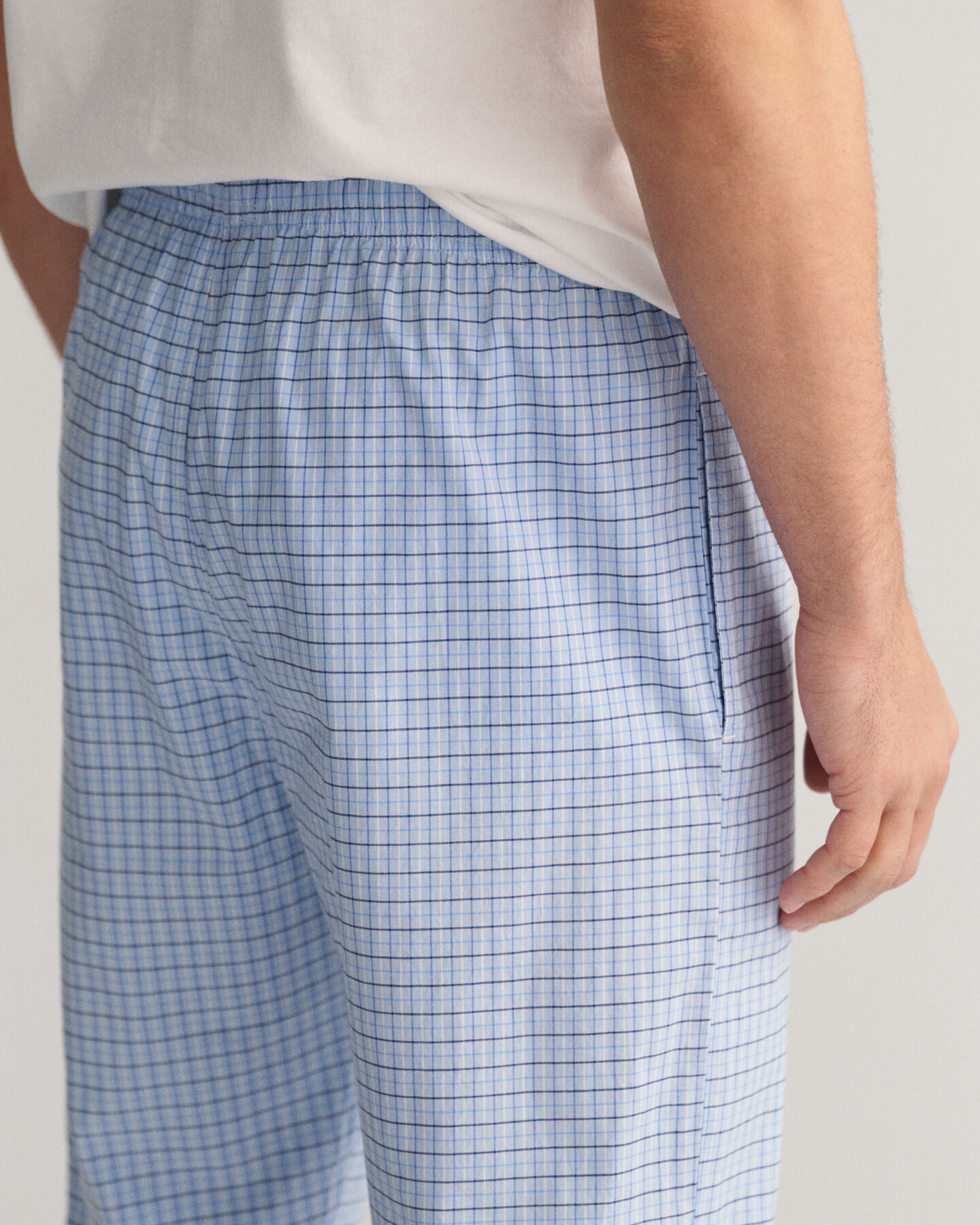 Calças de pijama com padrão de xadrez