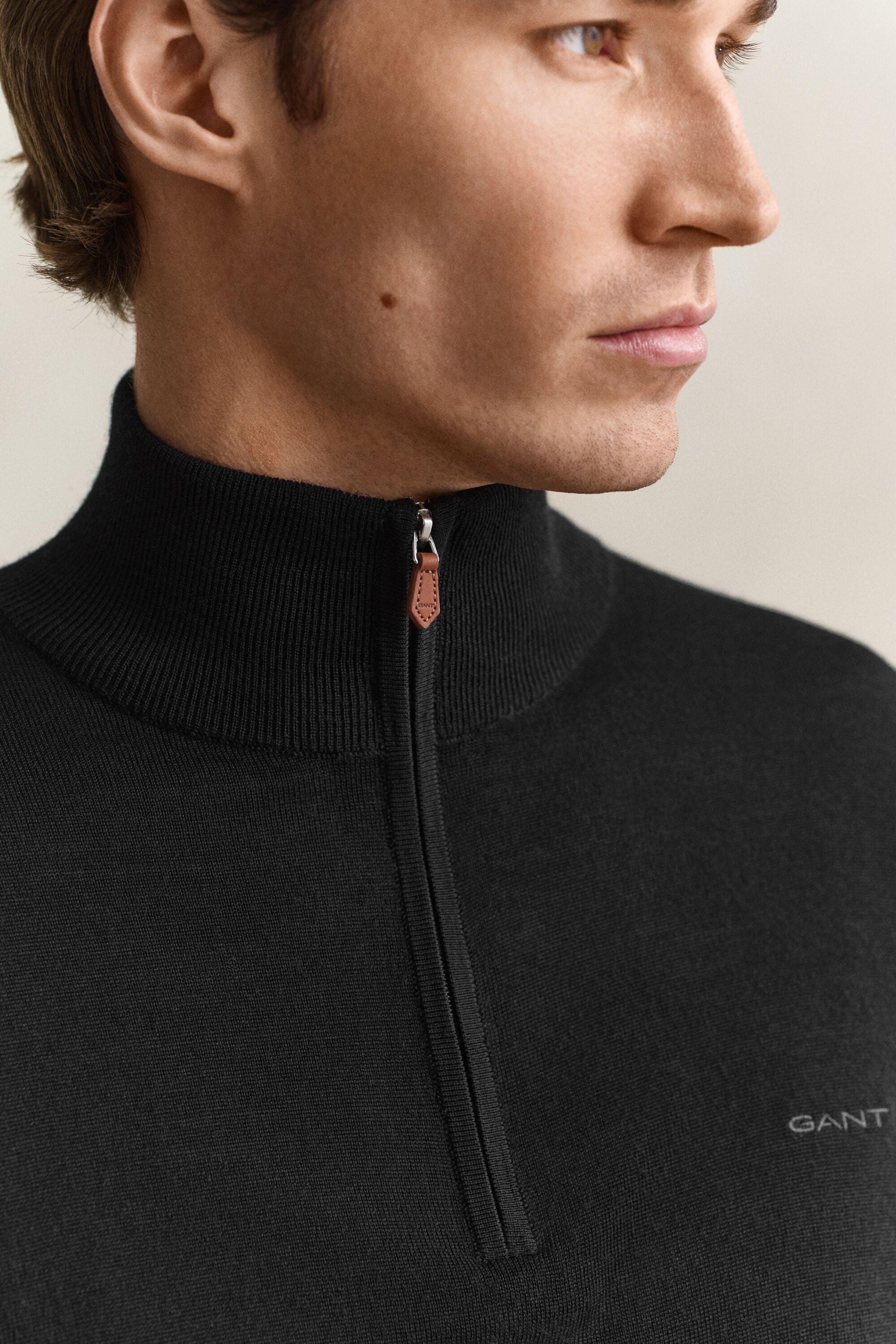 Camisola de malha com meio fecho de correr em lã de merino