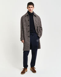 Calças desportivas com grafismo pequeno