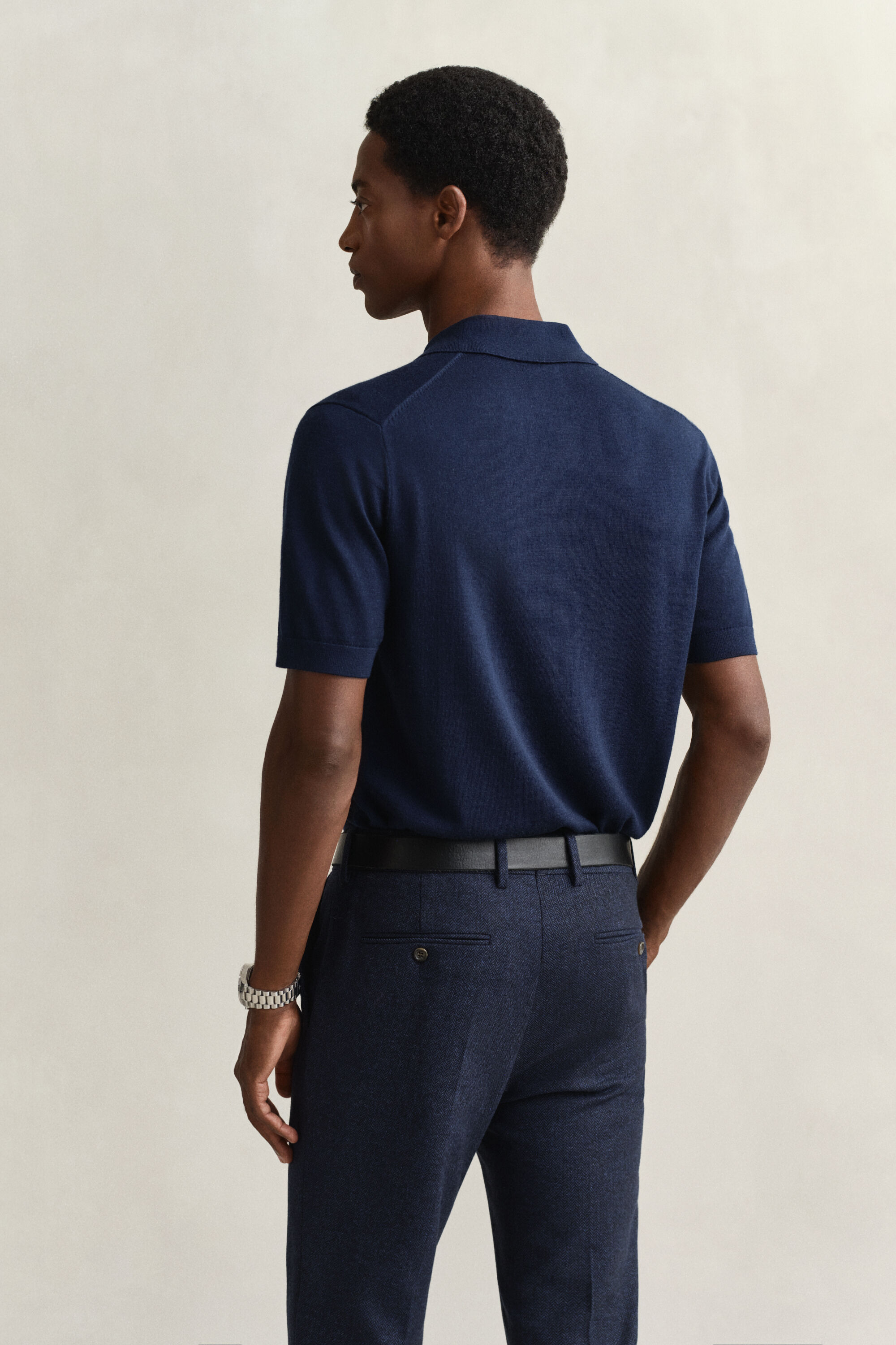 Camisola de malha estilo polo de manga curta em lã de merino extrafina