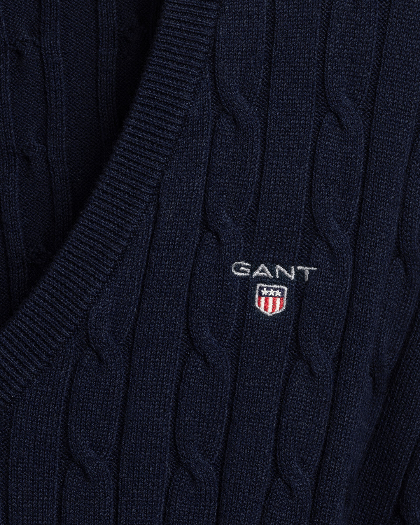 Pulover com decote em V entrelaçada em algodão com elastano