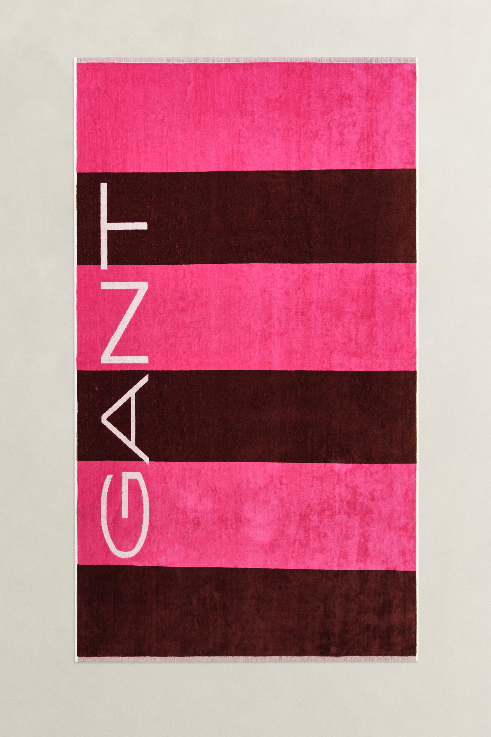 Toalha de praia às riscas em bloco