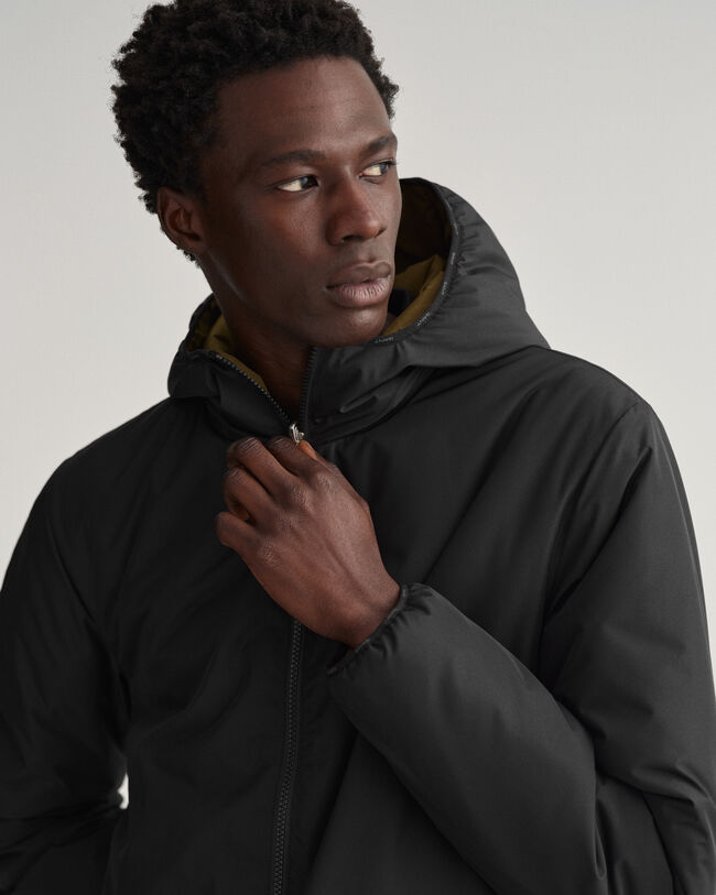 Casaco com capuz revers&iacute;vel