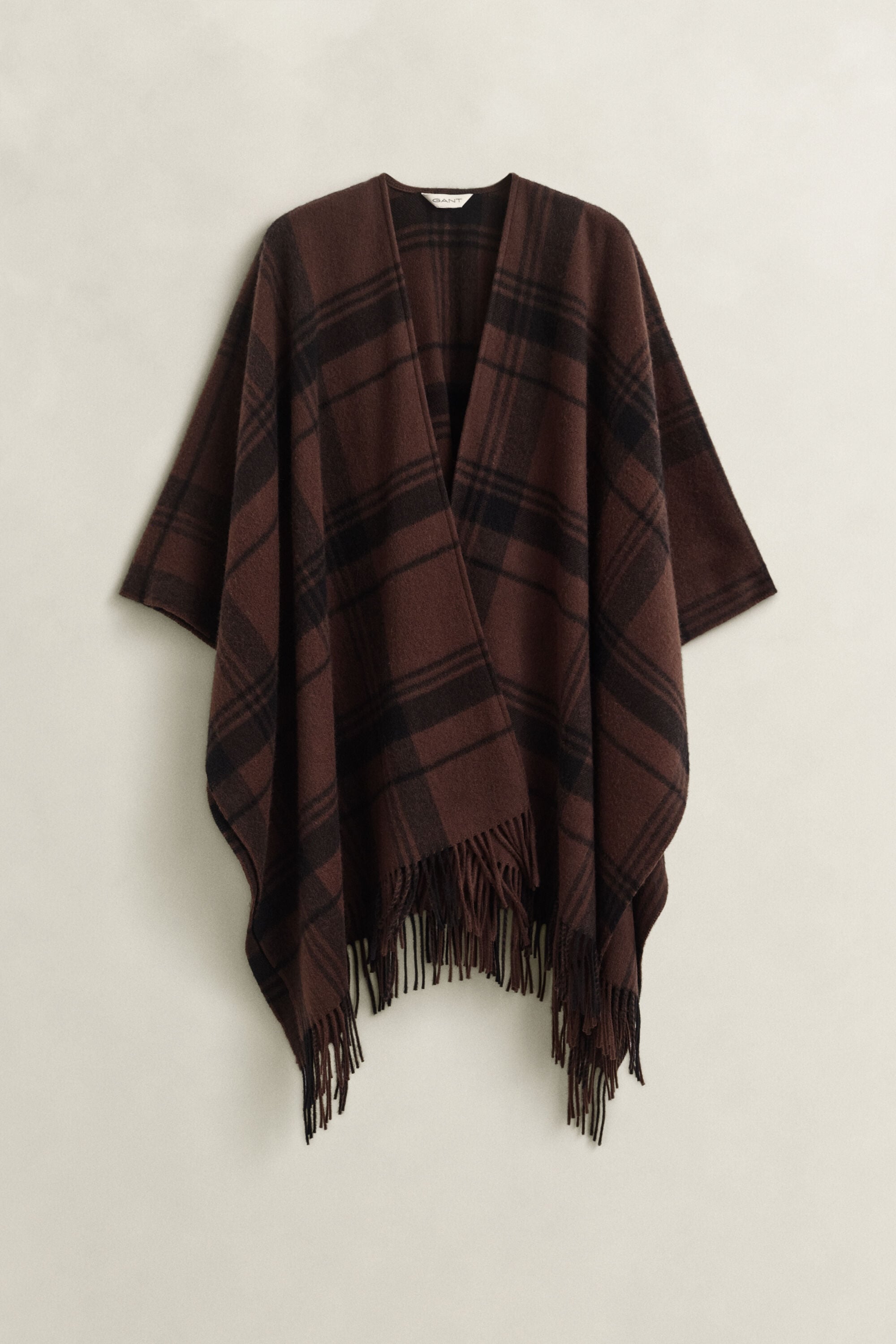 Poncho em lã com padrão de xadrez