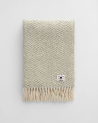 Manta decorativa em lã com padrão espinha de peixe