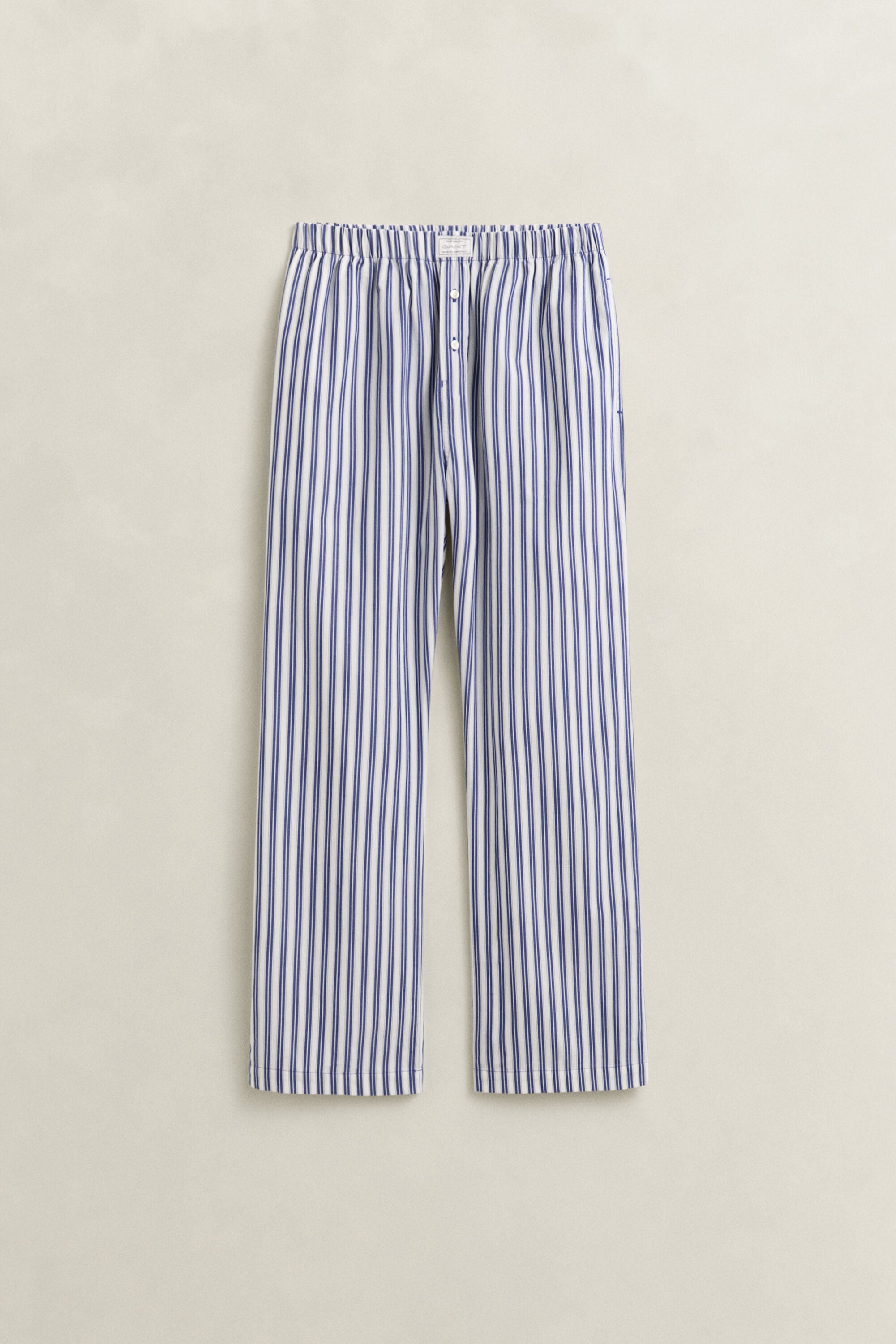 Calças de pijama às riscas