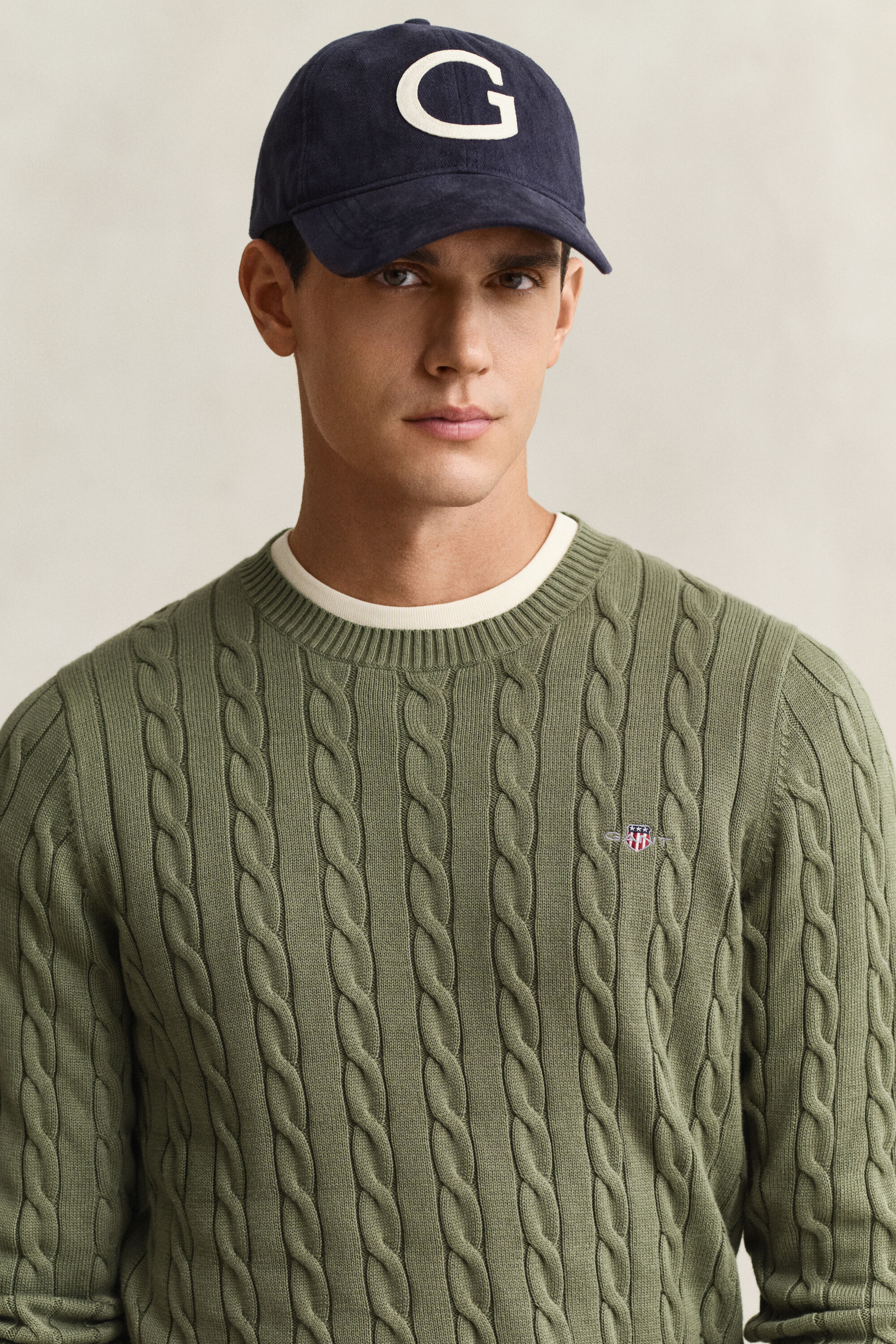 Camisola em malha entrançada de algodão com decote redondo