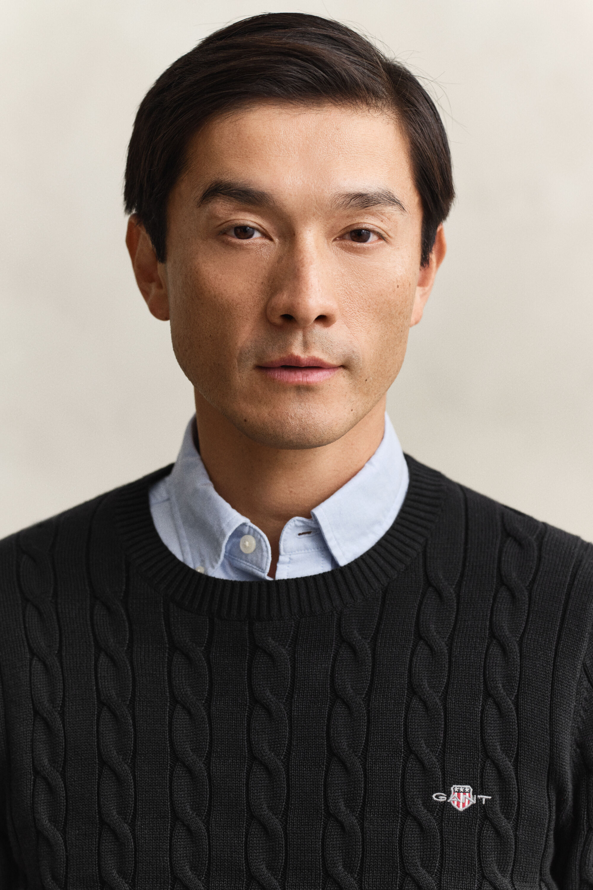 Camisola em malha entrançada de algodão com decote redondo