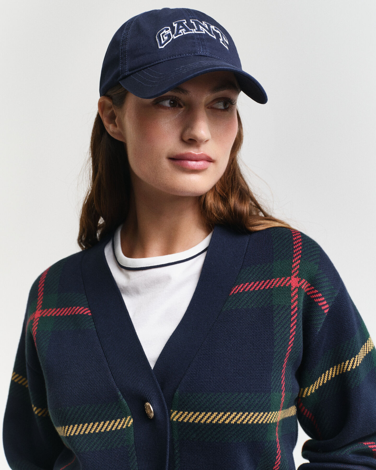 Casaco de malha com decote em V e padrão de xadrez