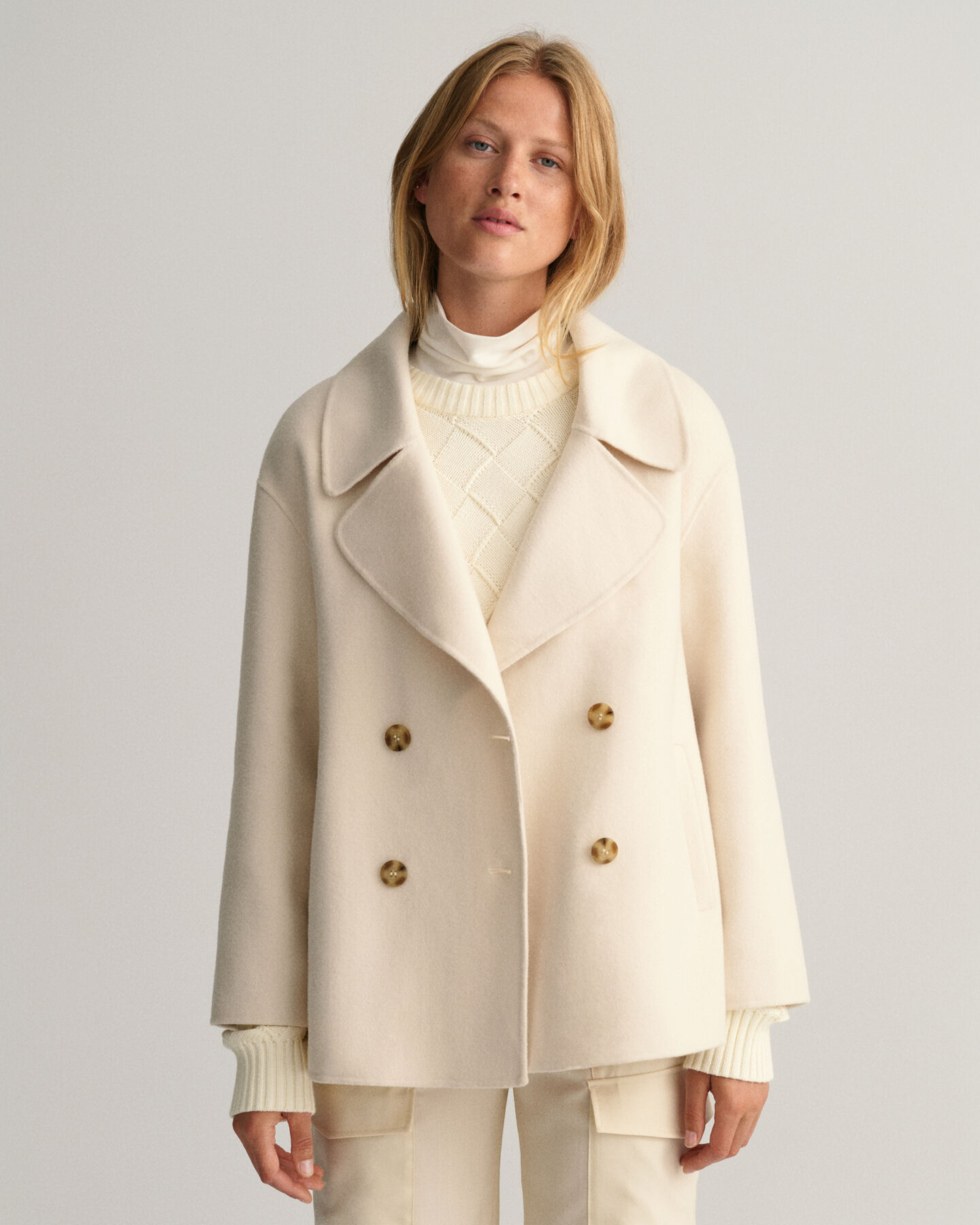 Casaco de marinheiro cosido &agrave; m&atilde;o