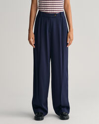 Calças chino com perna larga e cintura descida loose fit