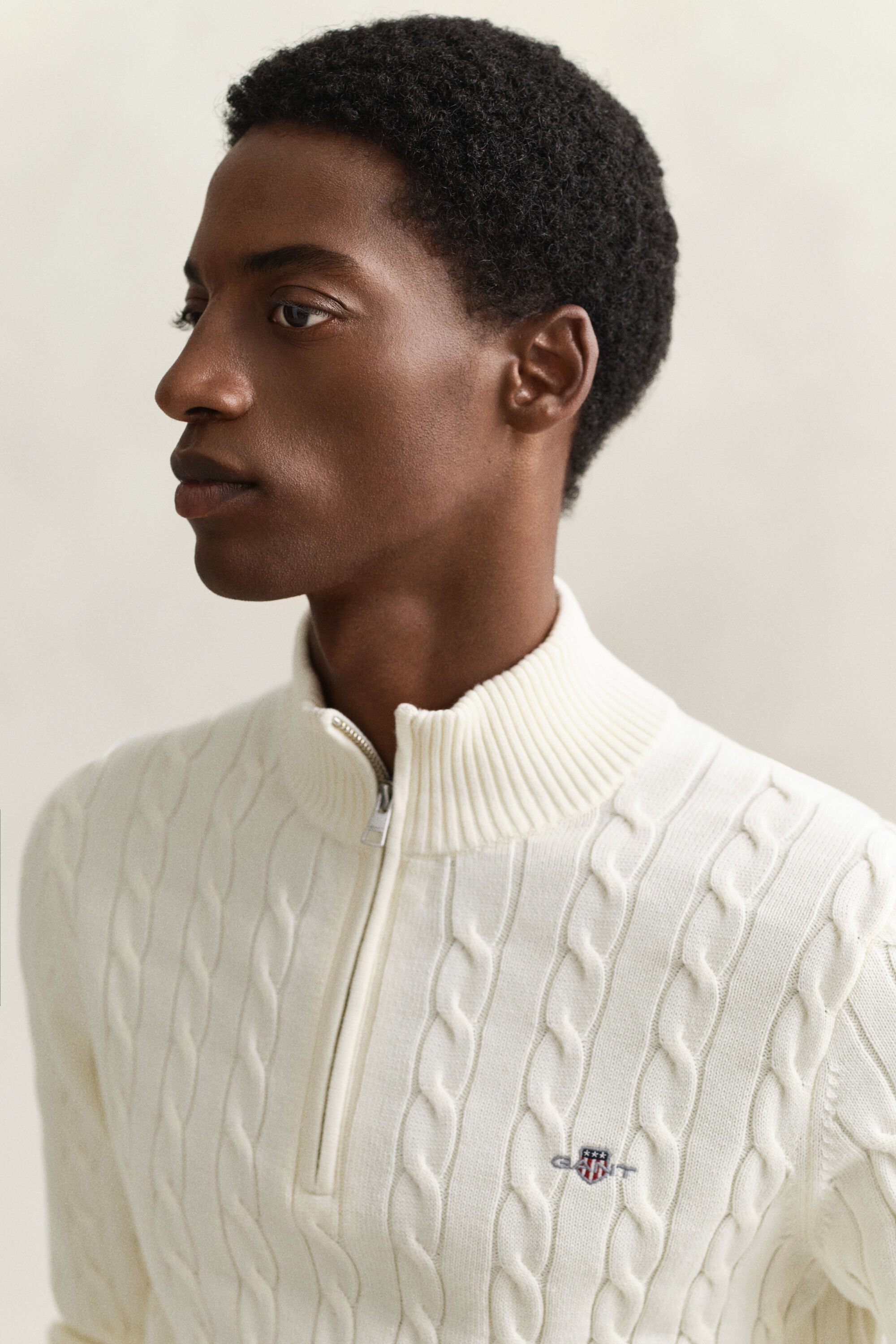 Camisola de malha entrançada de algodão com meio fecho de correr