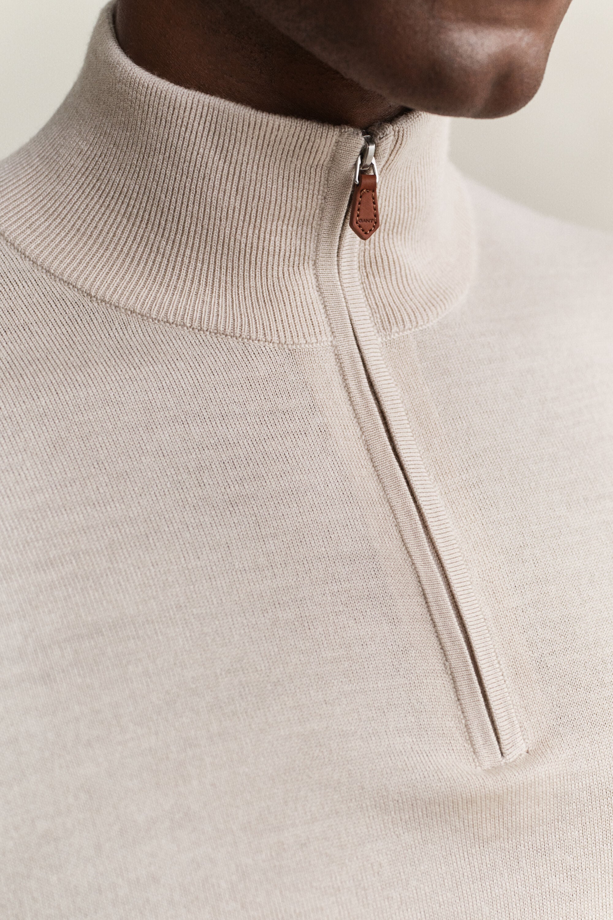 Camisola de malha com meio fecho de correr em lã de merino