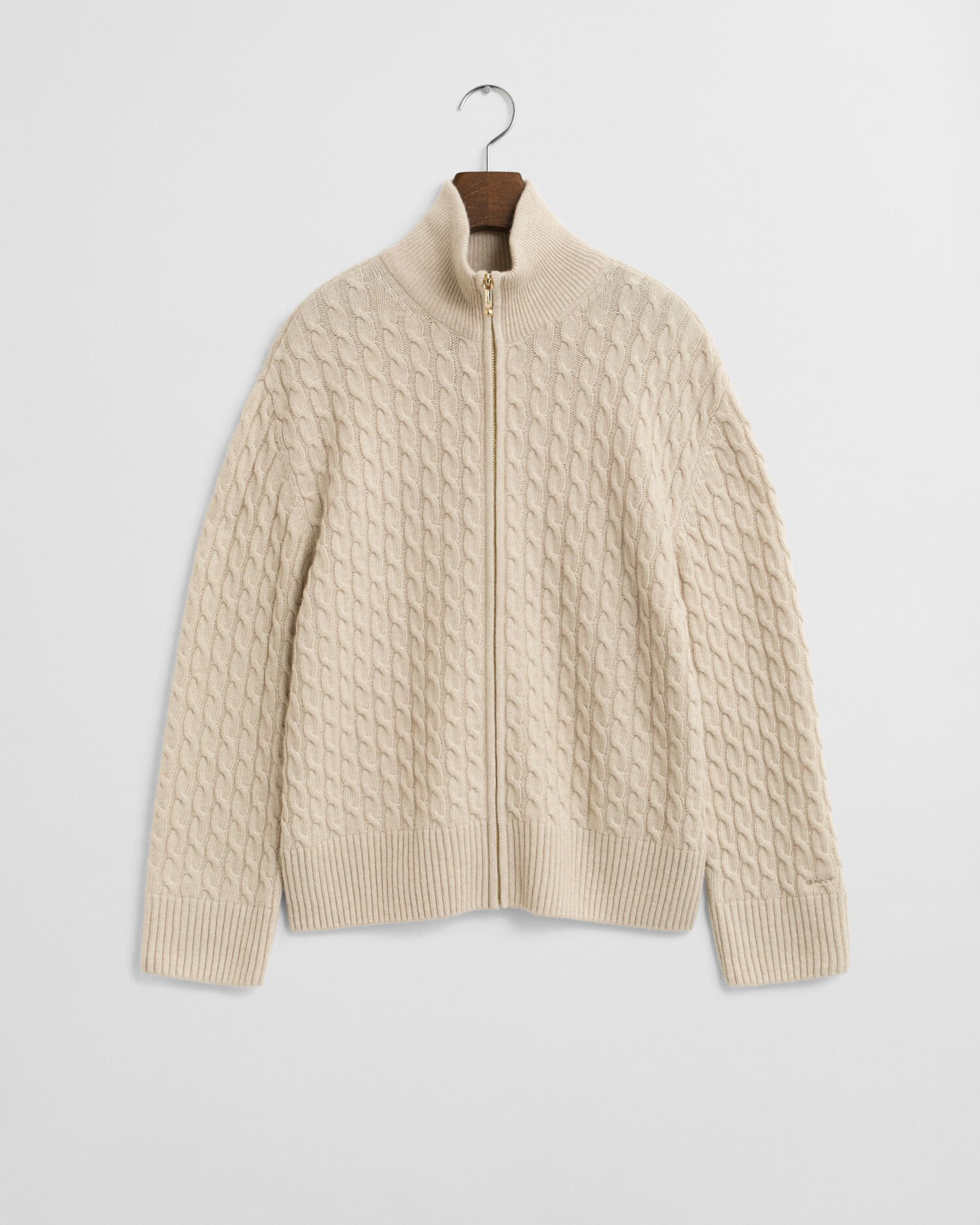 Casaco de malha entrançada com fecho de correr