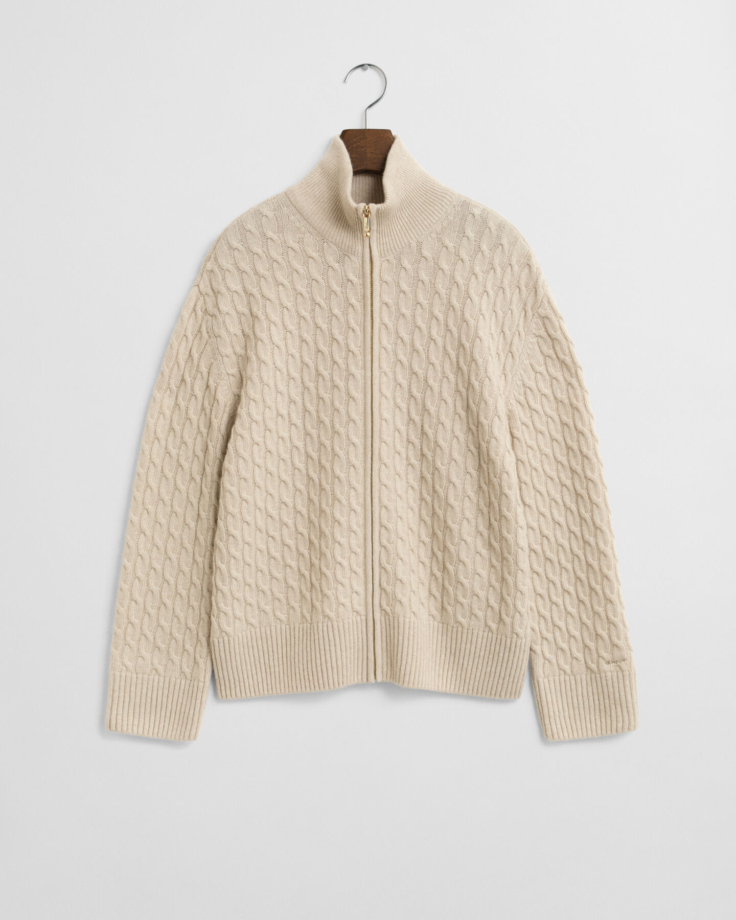 Casaco de malha entrançada com fecho de correr