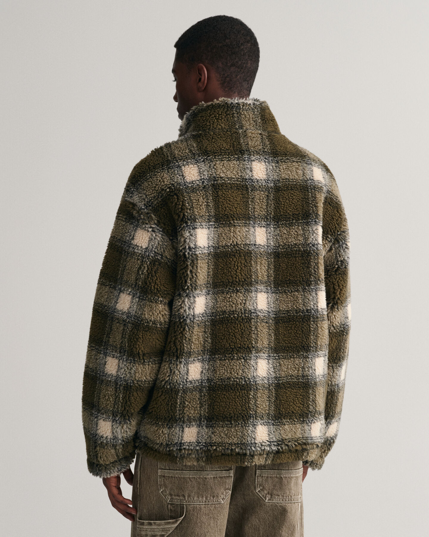 Polar com fecho de correr axadrezado