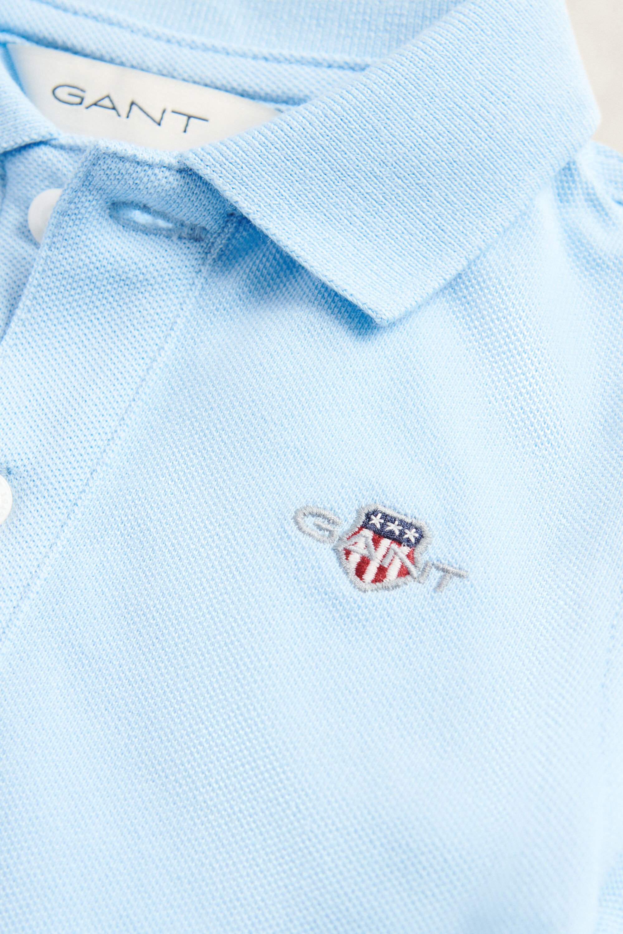 Polo em algodão piqué Shield Kids