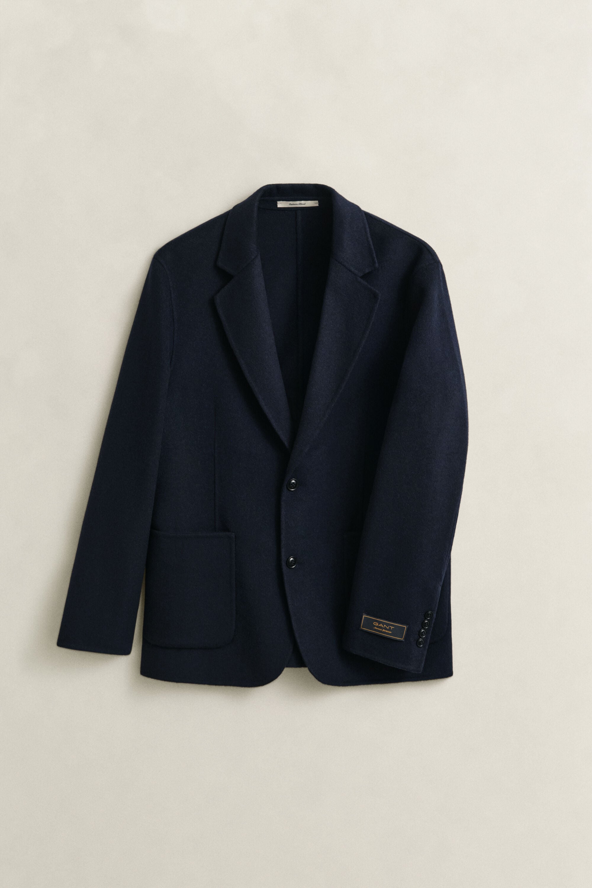 Blazer cosido à mão