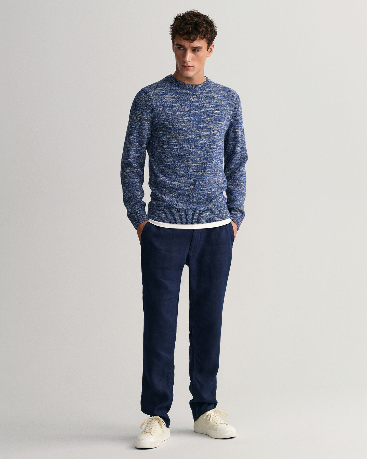 Pulover com decote redondo e fios torcidos