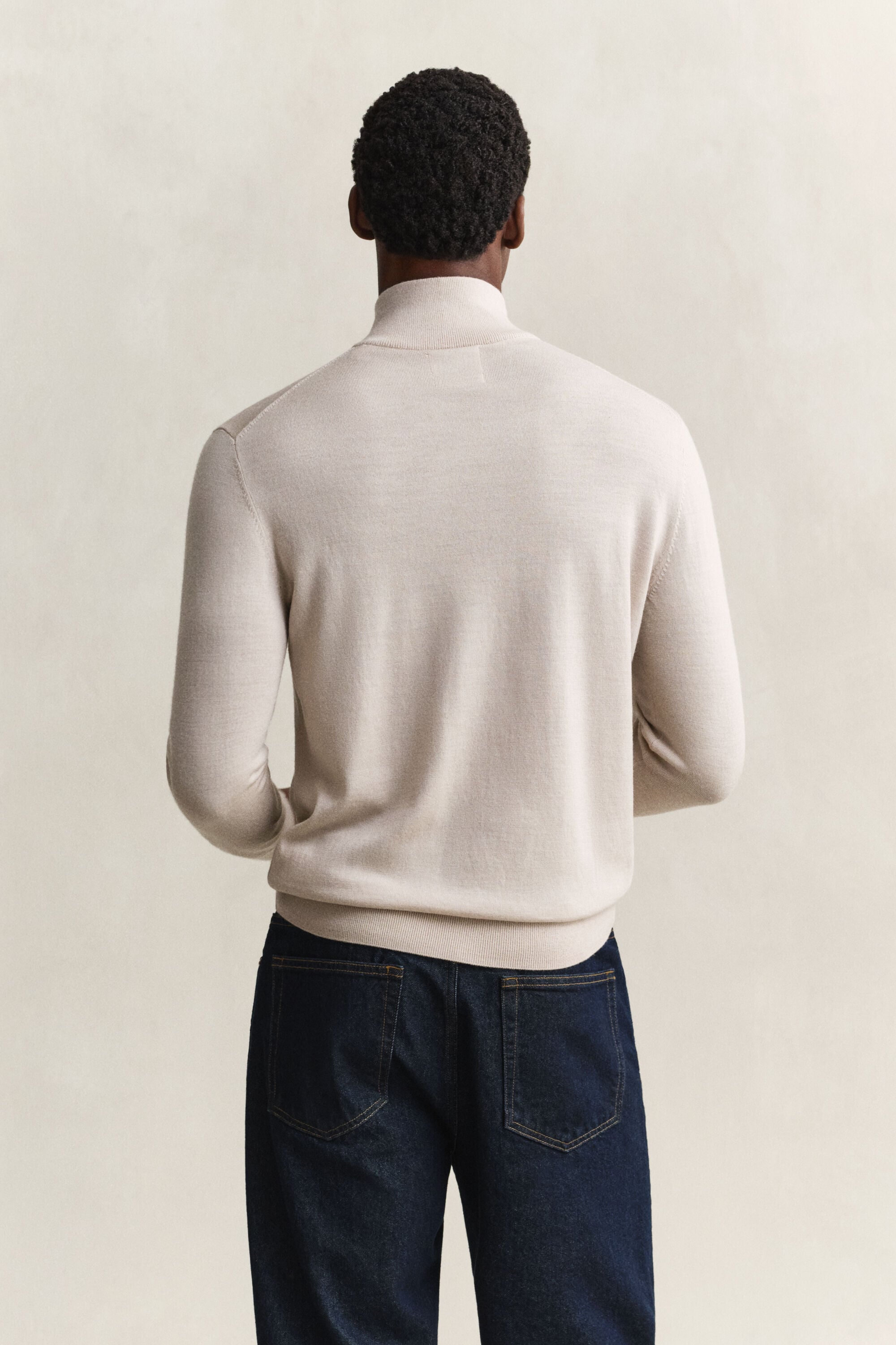 Camisola de malha com meio fecho de correr em lã de merino