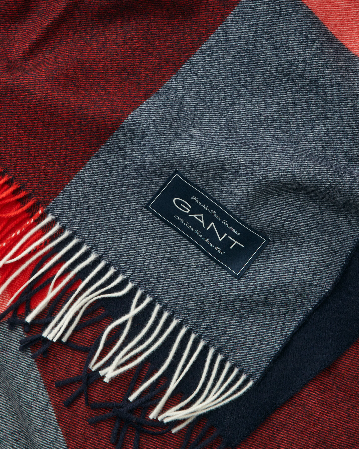 Manta decorativa com padrão de xadrez em lã de merino extrafina