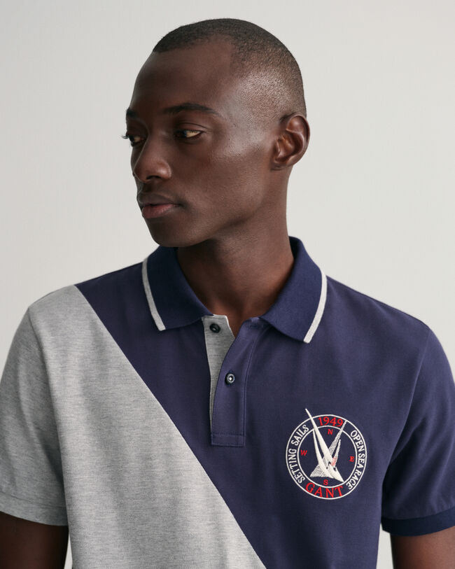 Polo em algod&atilde;o piqu&eacute; bloco de cor diagonal Sail Graphic